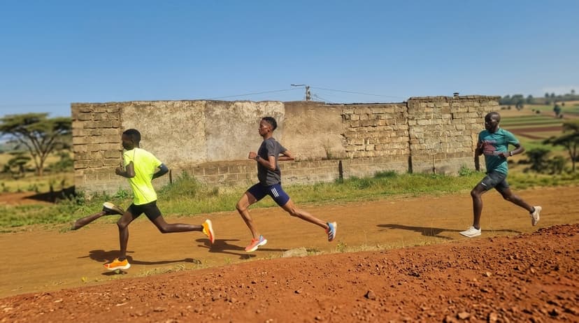 Group of runners training together on a Kenyan dirt road